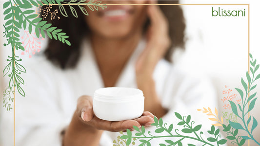 A woman holding a natural cream in a frame of leaves with the blissani logo