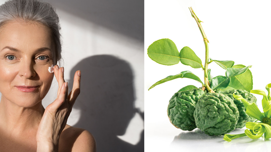 a mature woman in her 50s rubbing cream on her skin next to bergamot fruit
