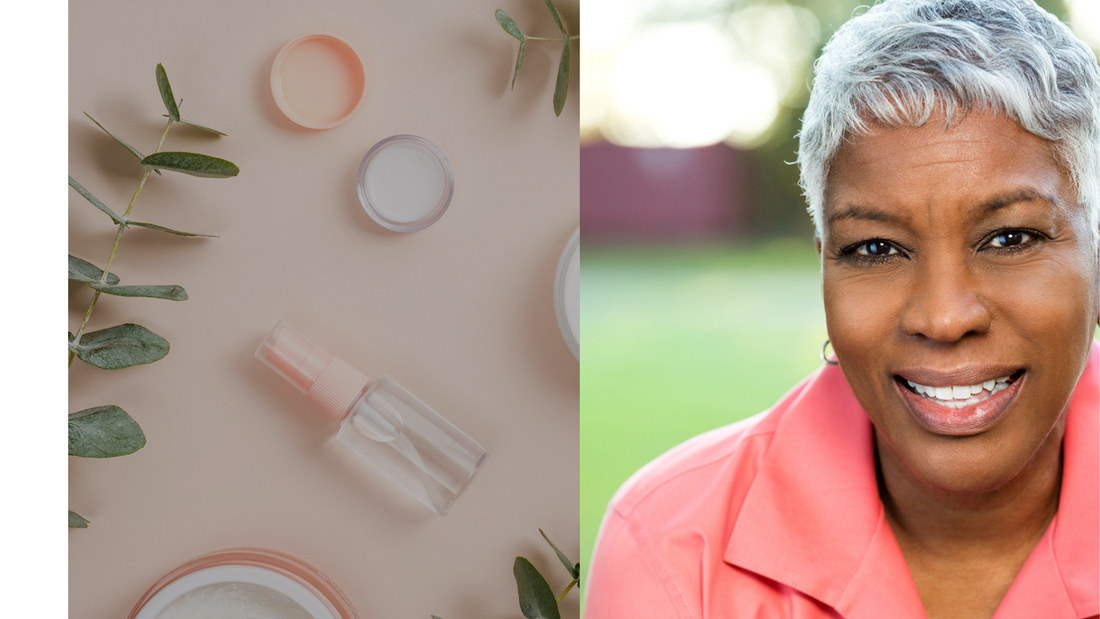 a variety of skincare products and some branches next to an a woman with smooth dark skin and grey hair
