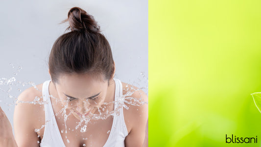 a woman washing her face next to a bright green field in close up